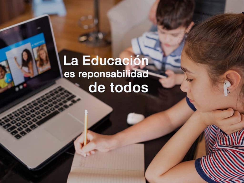 Artículo de la revista La Senda, La educación es responsabilidad de todos, imagen de niños en laptop como portada.